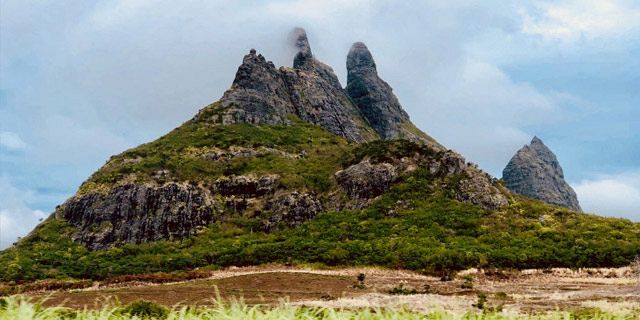 Trois Mamelles Mountain Hiking trail in Mauritius featuring rugged peaks scenic landscapes and breathtaking panoramic views.